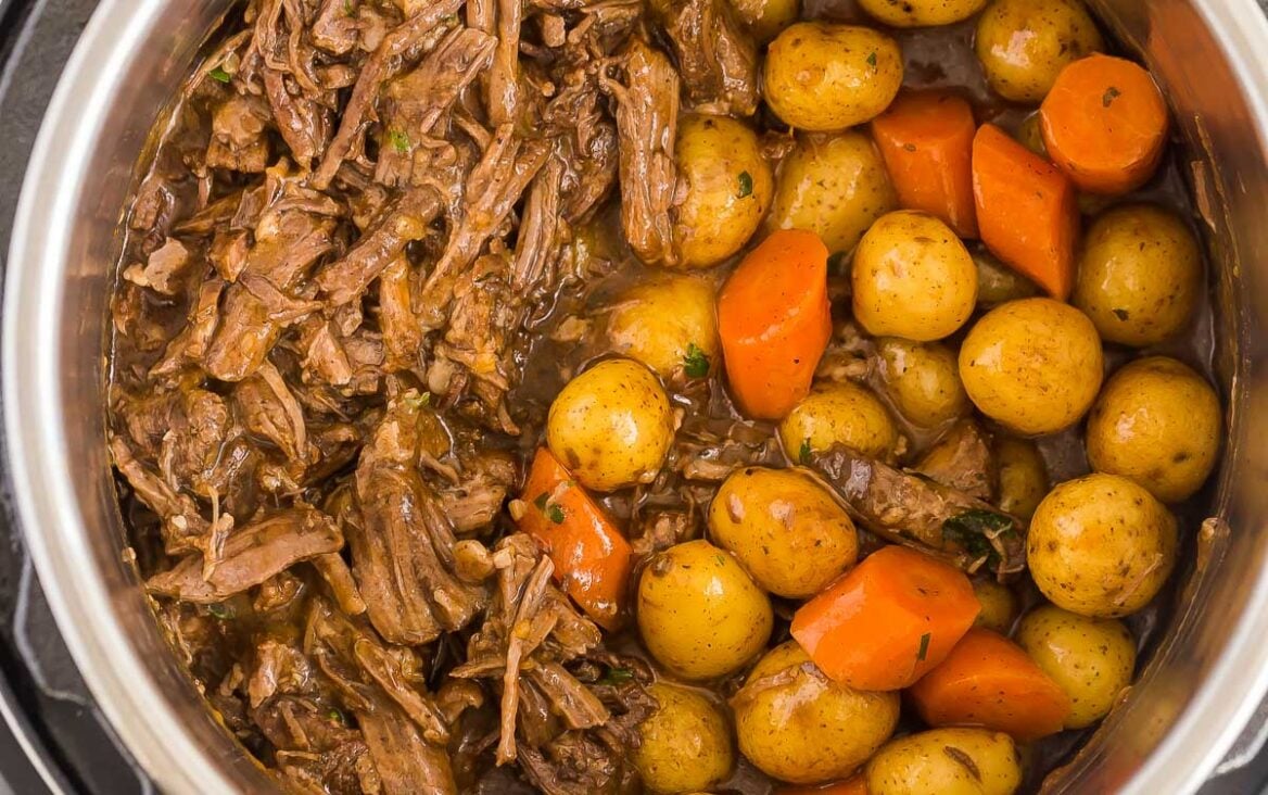 square overhead image of instant pot pot roast with vegetables.