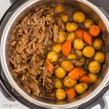 square overhead image of instant pot pot roast with vegetables.