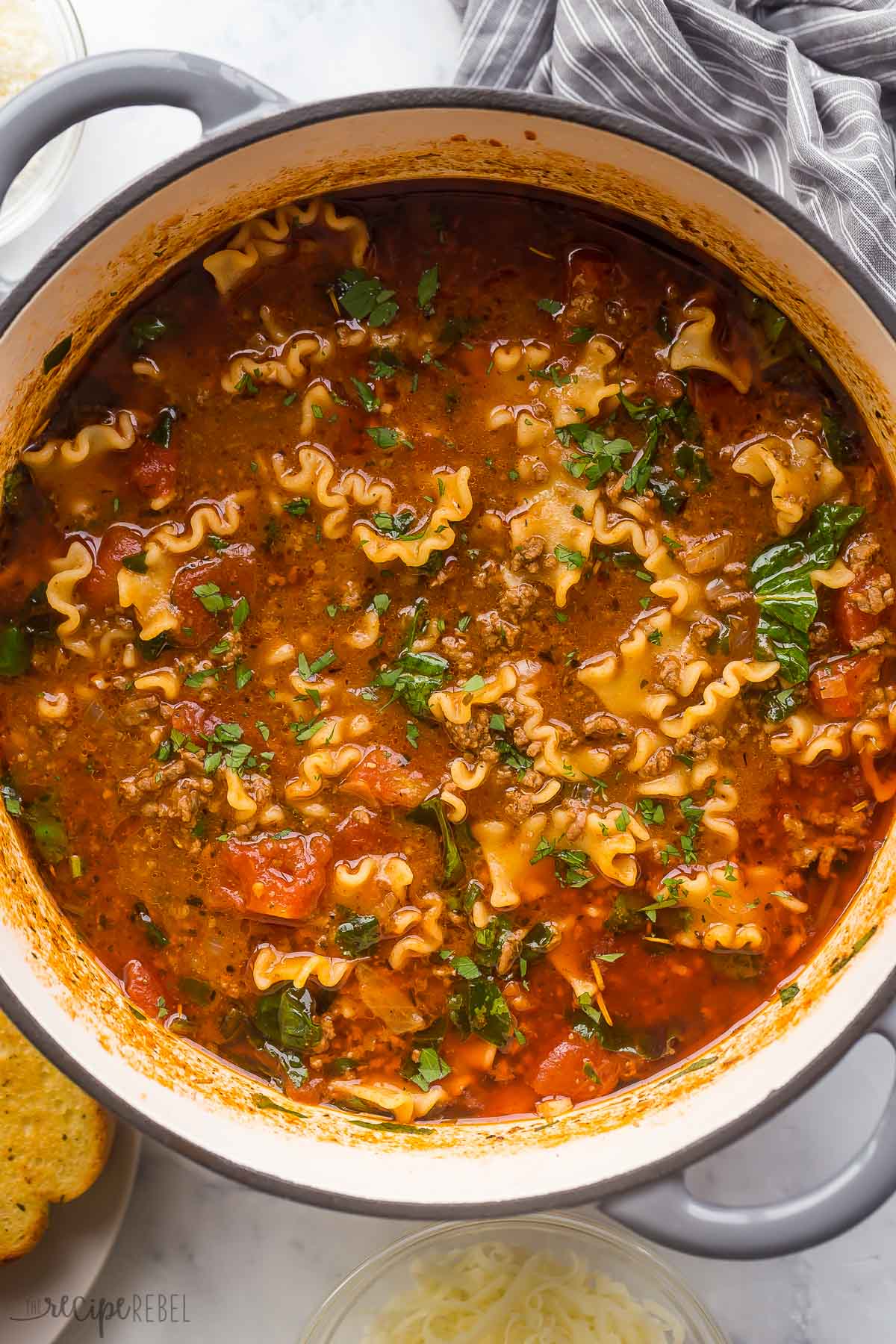 overhead image of lasagna soup in dutch oven