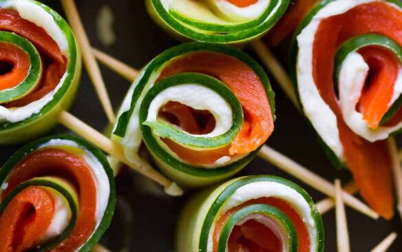 Overhead view of a smoked salmon cucumber roll-ups