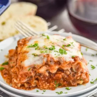 A slice of turkey lasagna on a plate.