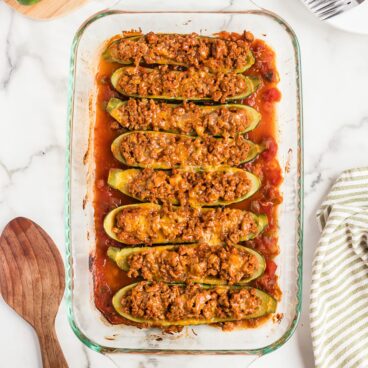 Turkey Taco meat baked inside zucchini boat halves.