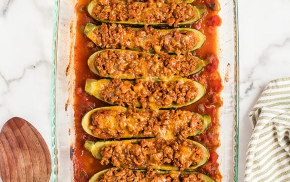 Turkey Taco meat baked inside zucchini boat halves.