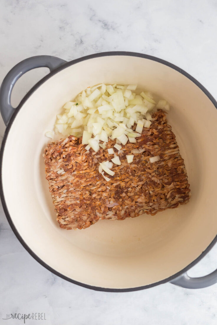 italian sausage and onion in a large dutch oven