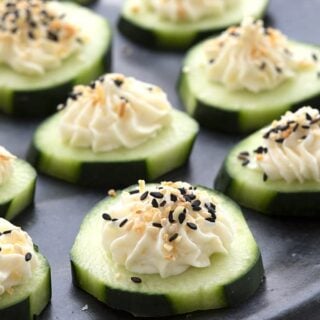 A plate of everything bagel cucumber bites