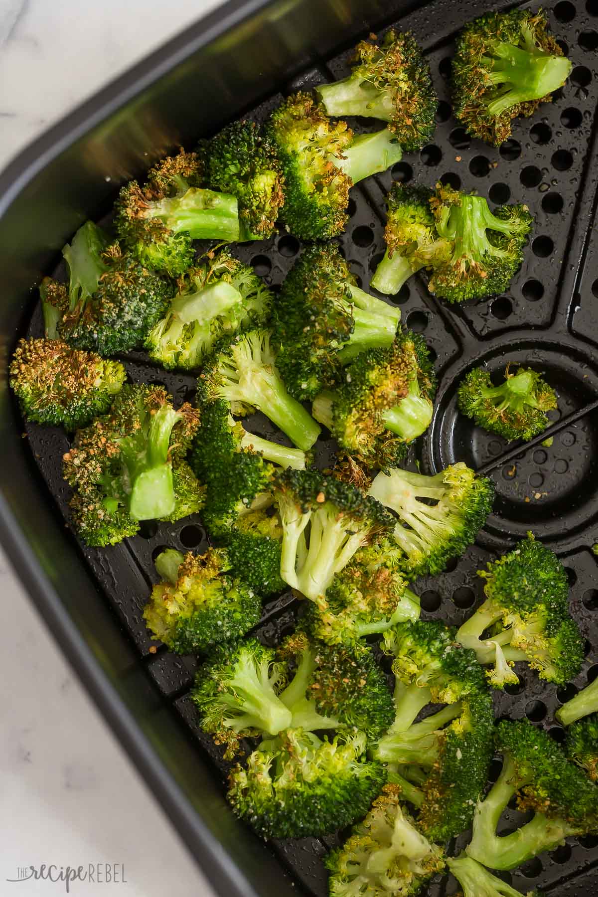 garlic parmesan broccoli in air fryer basket