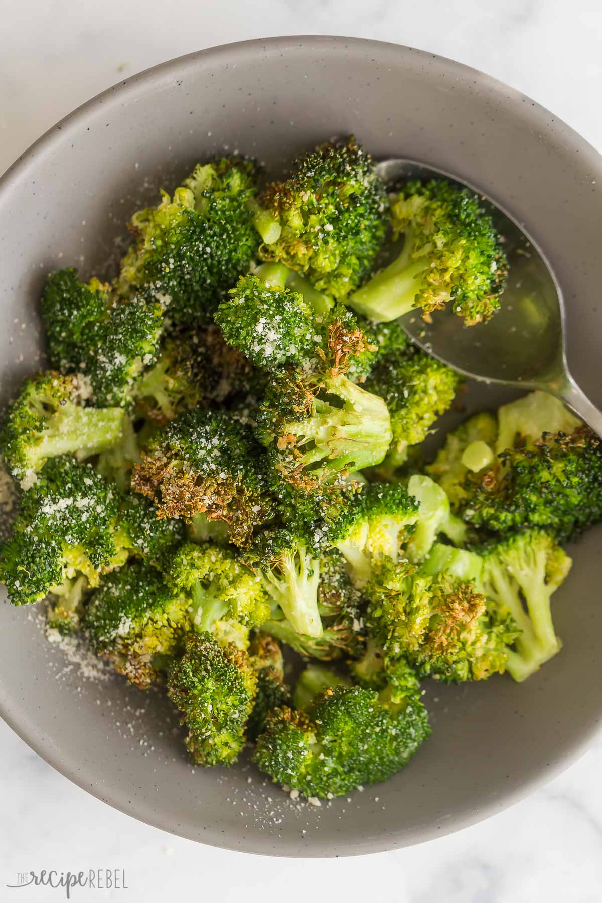 air fryer broccoli in a grey bowl