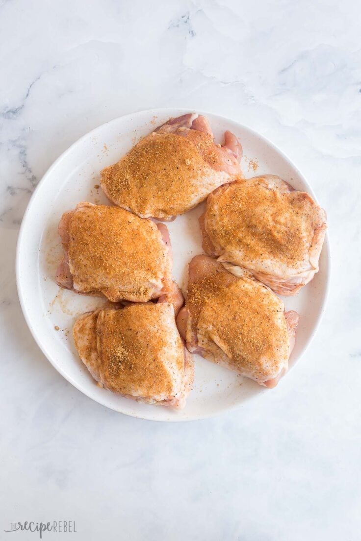 seasoned chicken thighs on plate