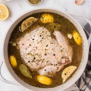 overhead image of chicken in brine