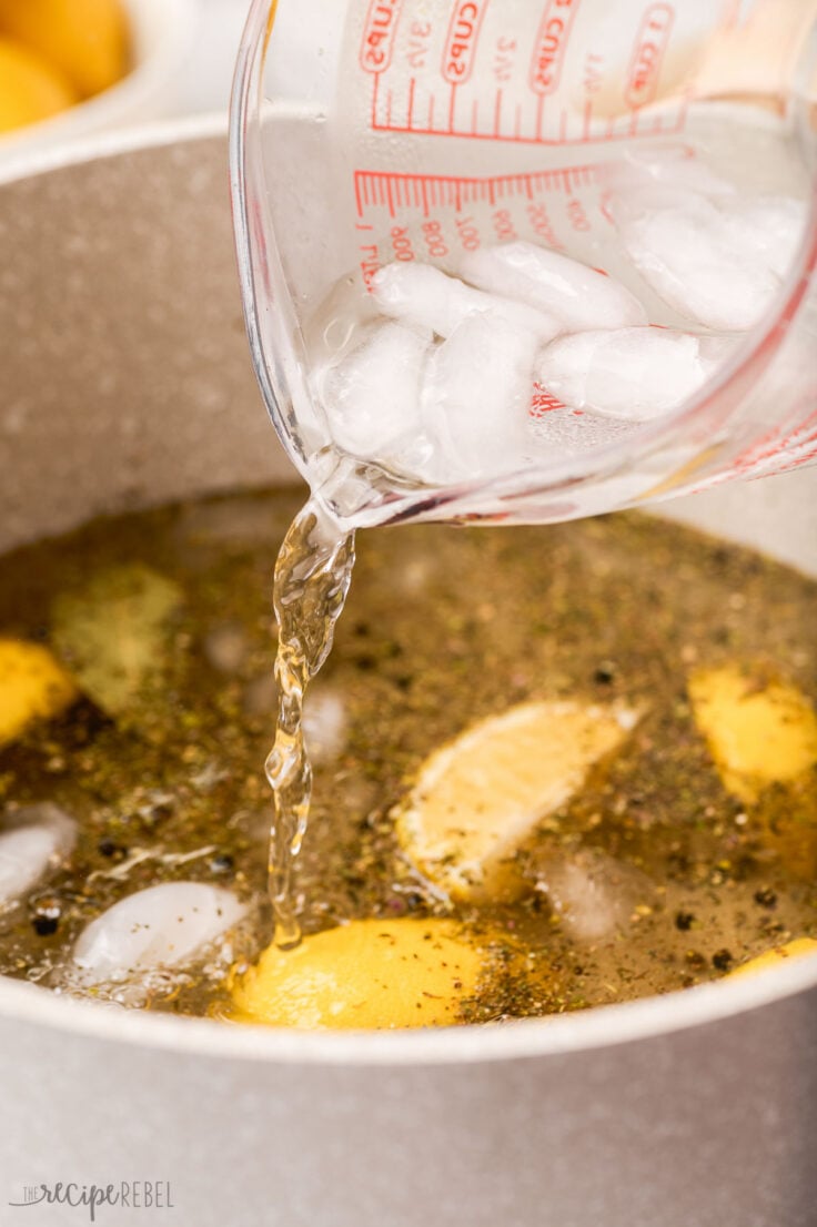 adding ice to chicken brine to cool it