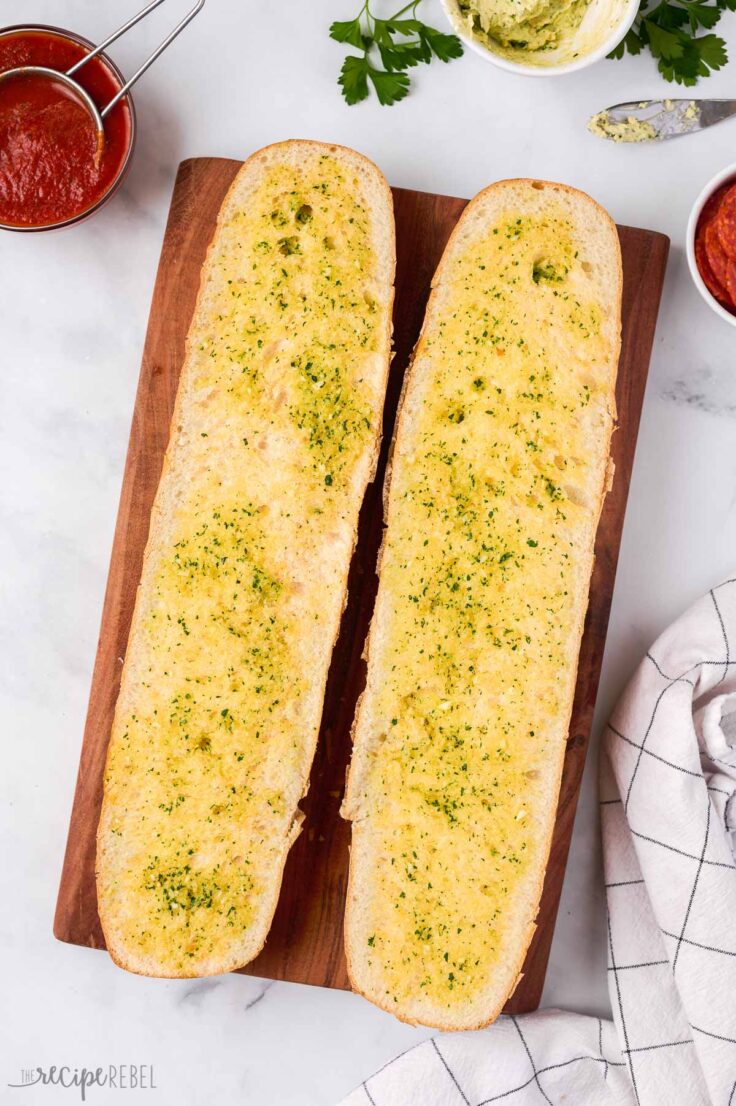 garlic butter spread on cut halves of french bread