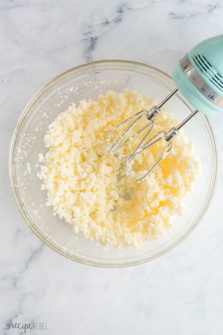 beating sugar and butter with electric mixer