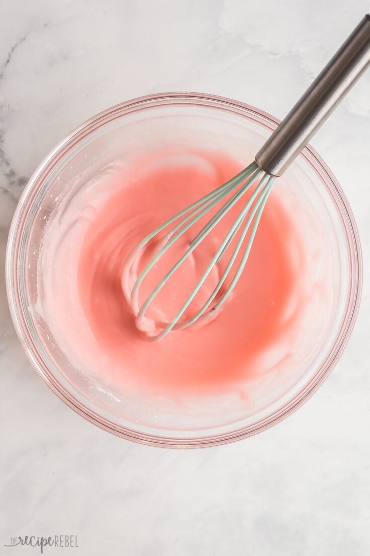 pink frosting stirred together with whisk
