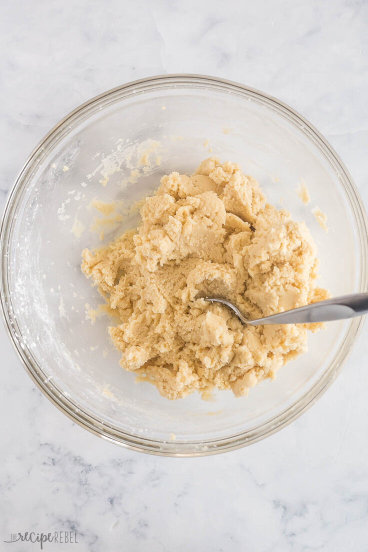 soft sugar cookie dough in glass bowl with spoon