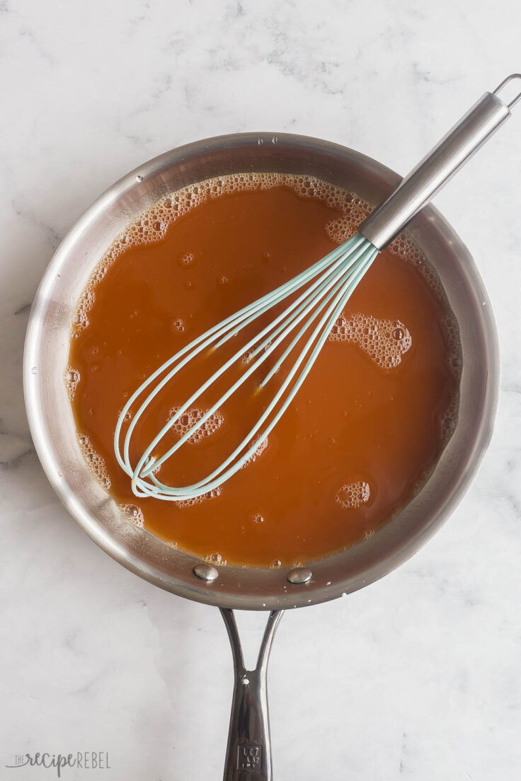 ingredients for sweet and sour sauce whisked together in skillet