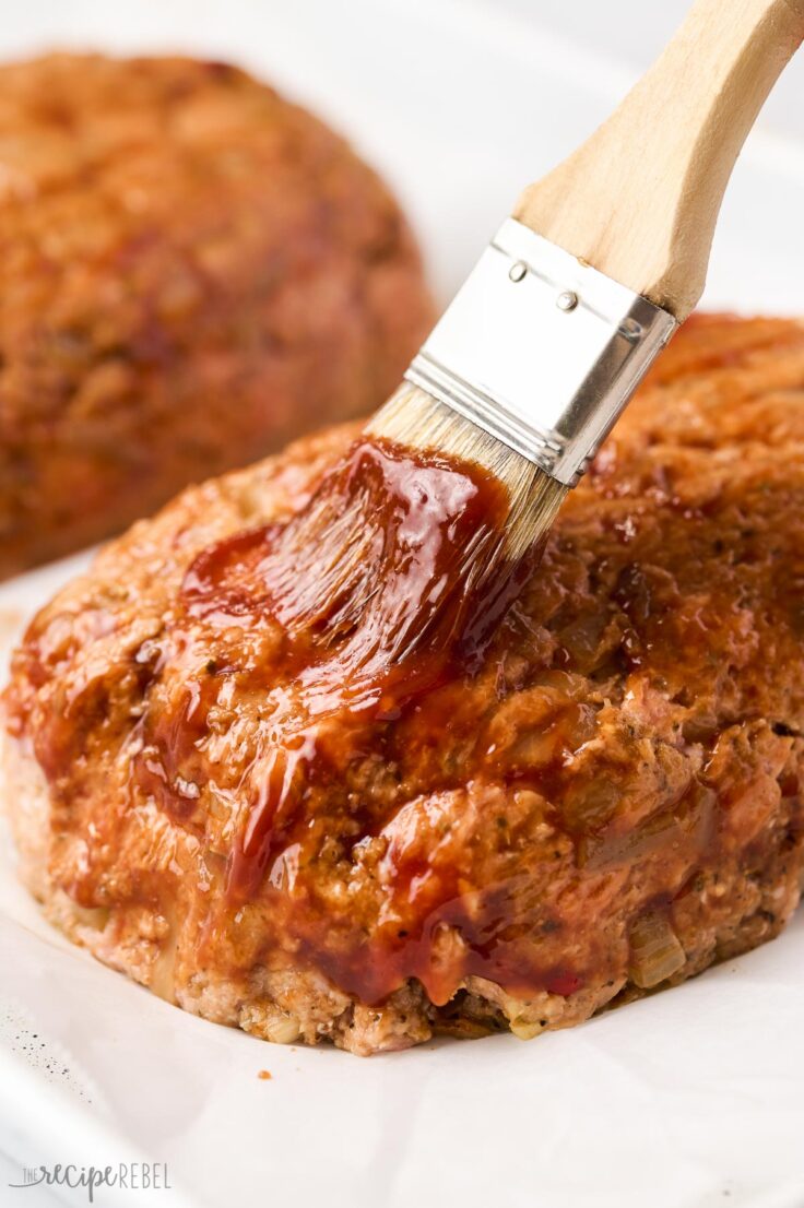 brushing glaze on meatloaf before finishing