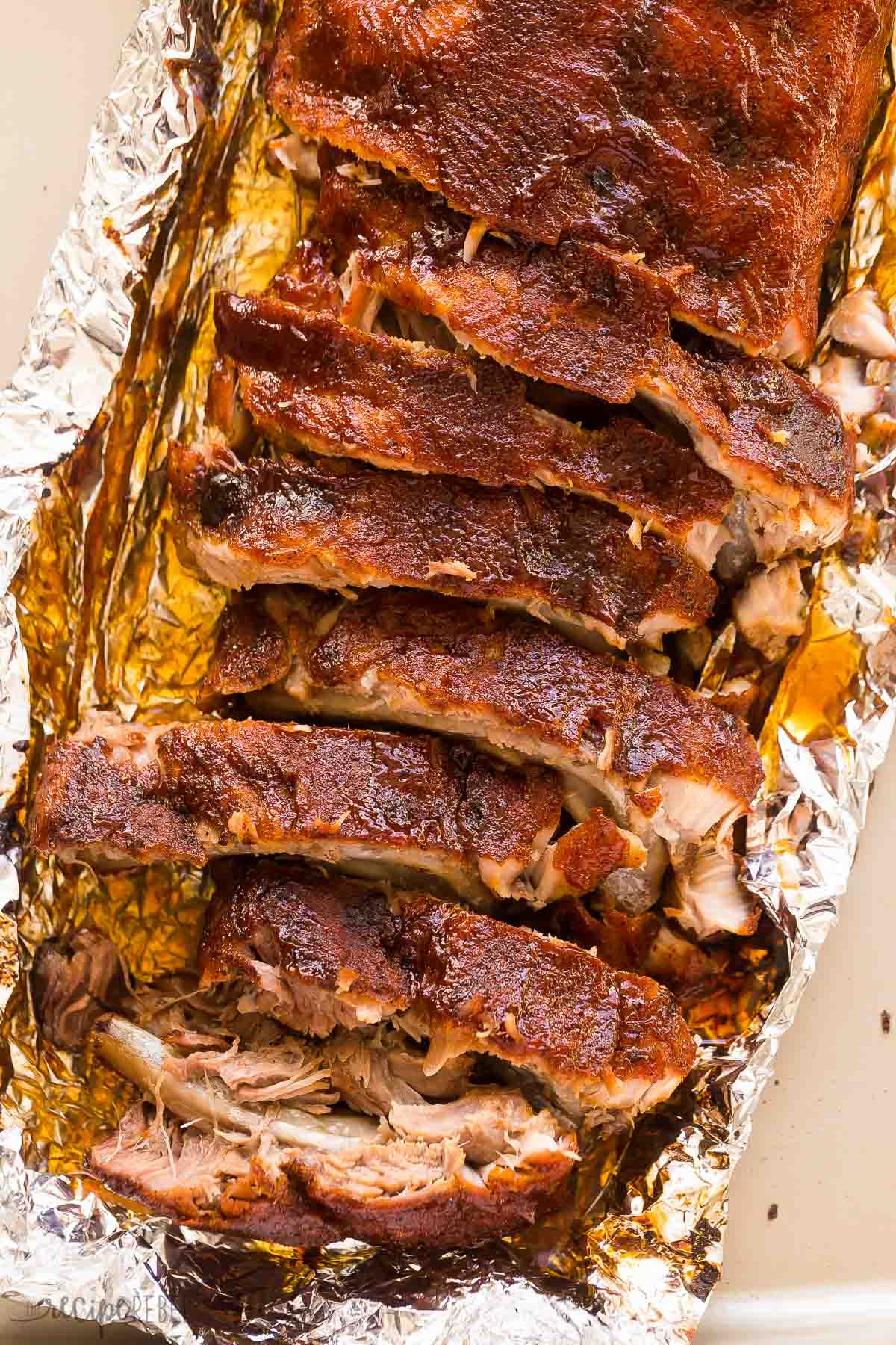 close up image of sliced ribs in foil