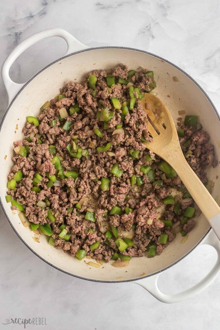 ground beef and peppers cooked in large skillet