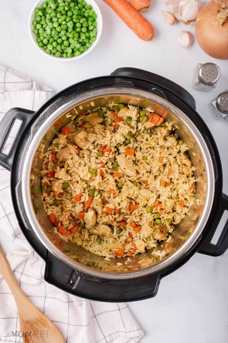 overhead image of cooked chicken and rice in instant pot pressure cooker