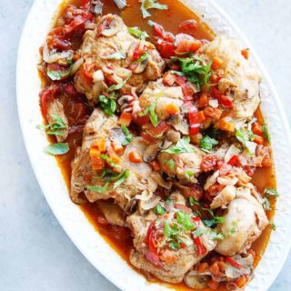 Chicken cacciatore on a serving tray.