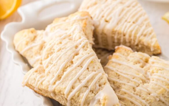 A pile of lemon scones in a baking dish.