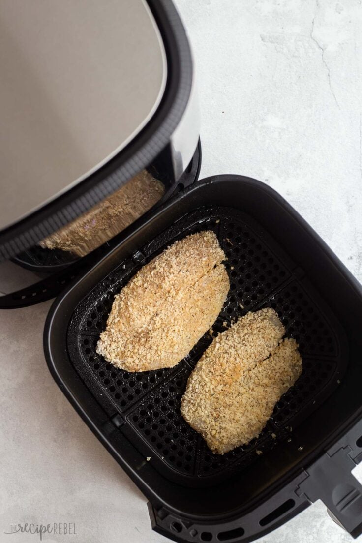 breaded tilapia going into air fryer