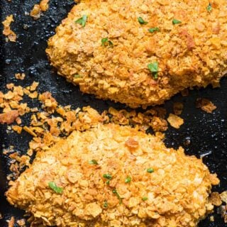 Baked ranch chicken on a baking sheet.