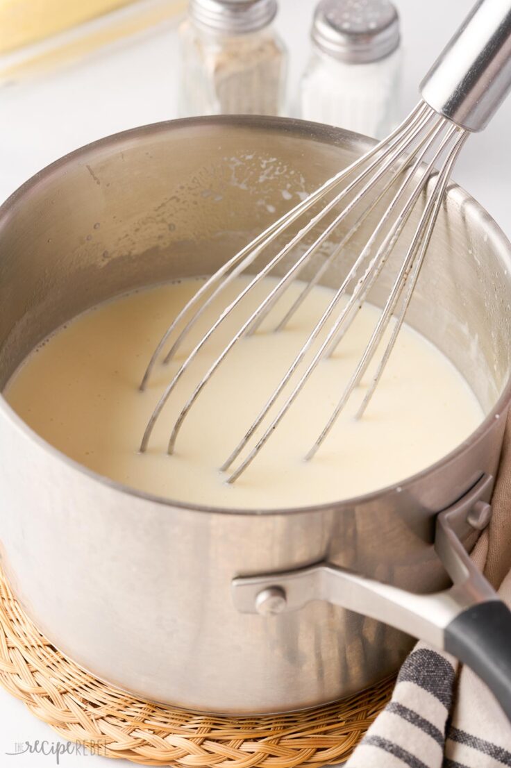 milk whisked into roux to form bechamel sauce