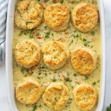 overhead image of chicken pot pie casserole with biscuits