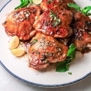 A pile of Vietnamese chicken thighs on a plate.