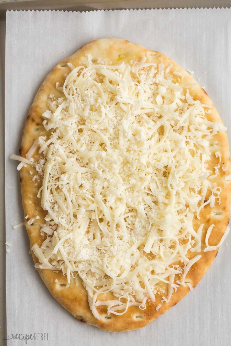 white flatbread pizza before cooking