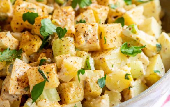 A large bowl of Cajun potato salad.