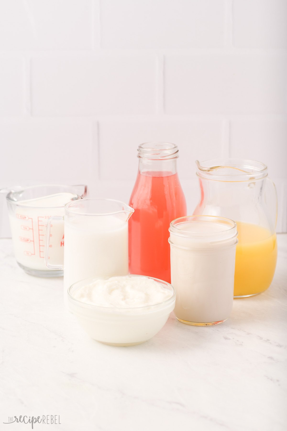 some liquid options for smoothies including juice and milks