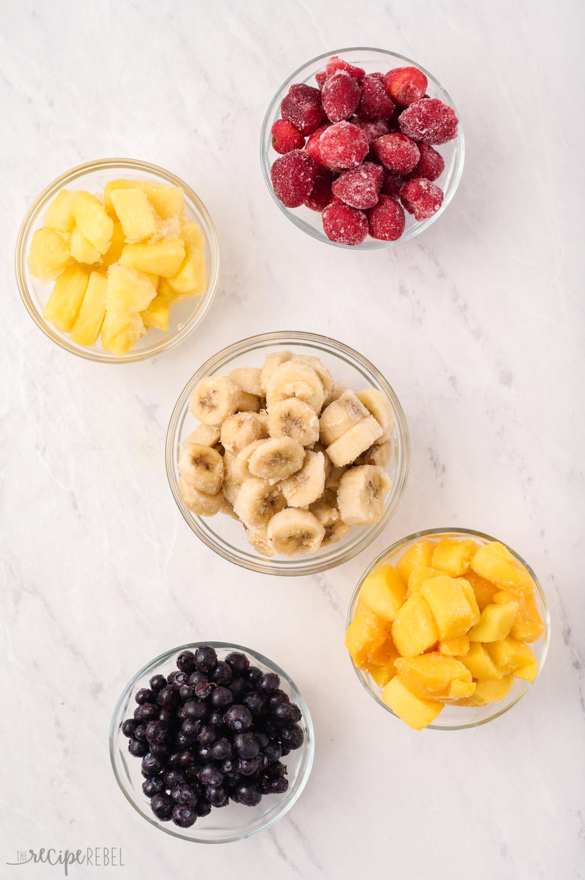 frozen fruit options for smoothies in glass bowls
