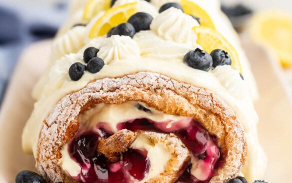 close up image of finished lemon blueberry roll cake