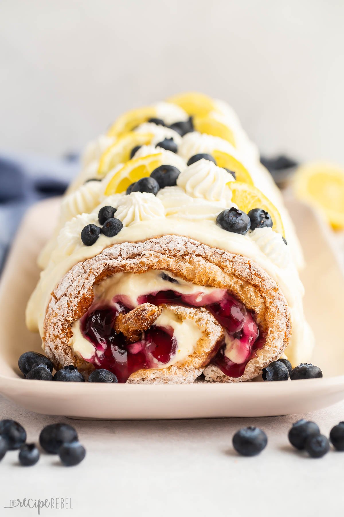 close up image of finished lemon blueberry roll cake