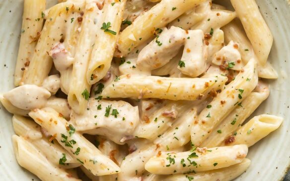 overhead image of chicken bacon ranch pasta in grey bowl