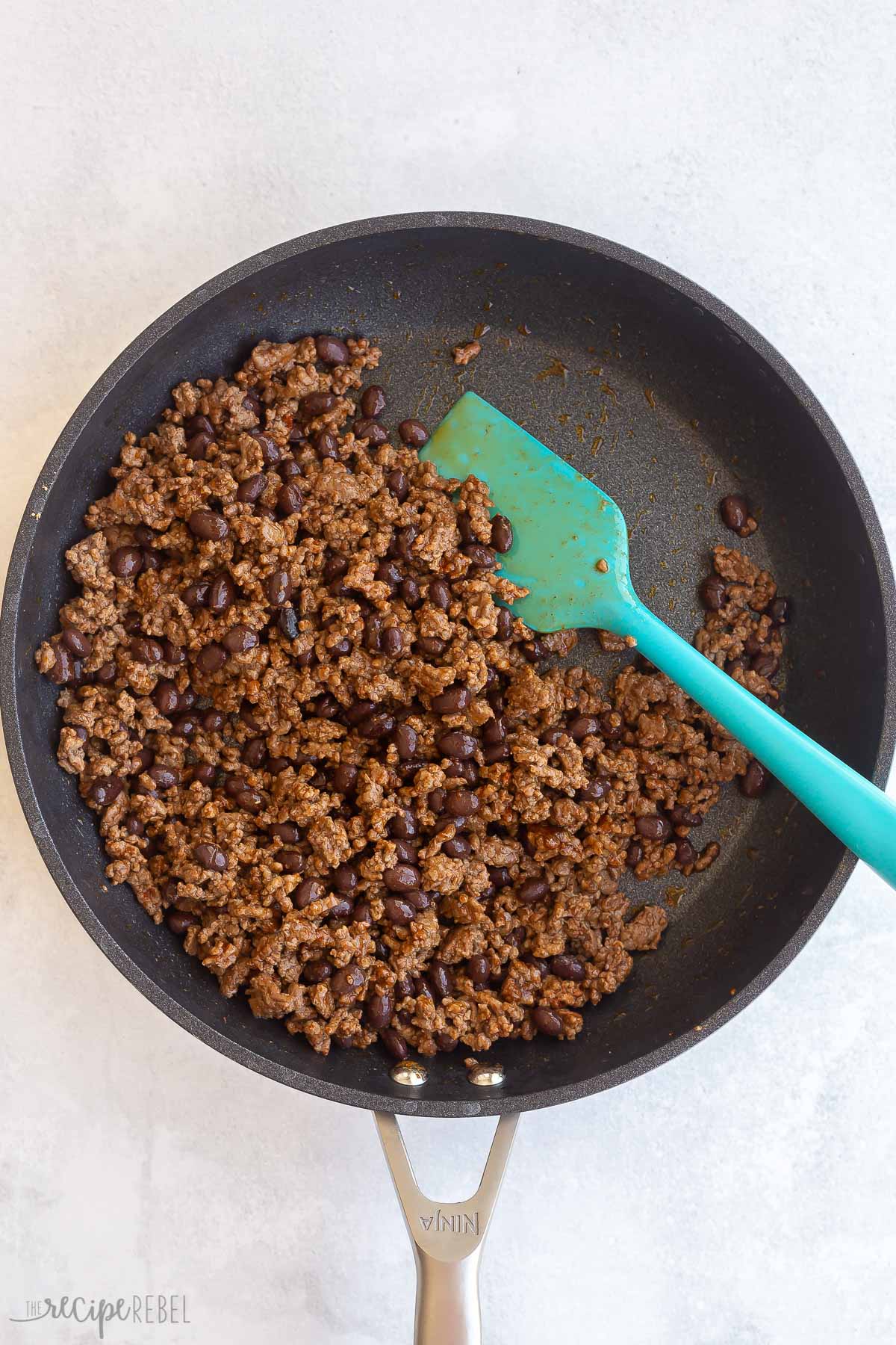 finished taco meat in black skillet