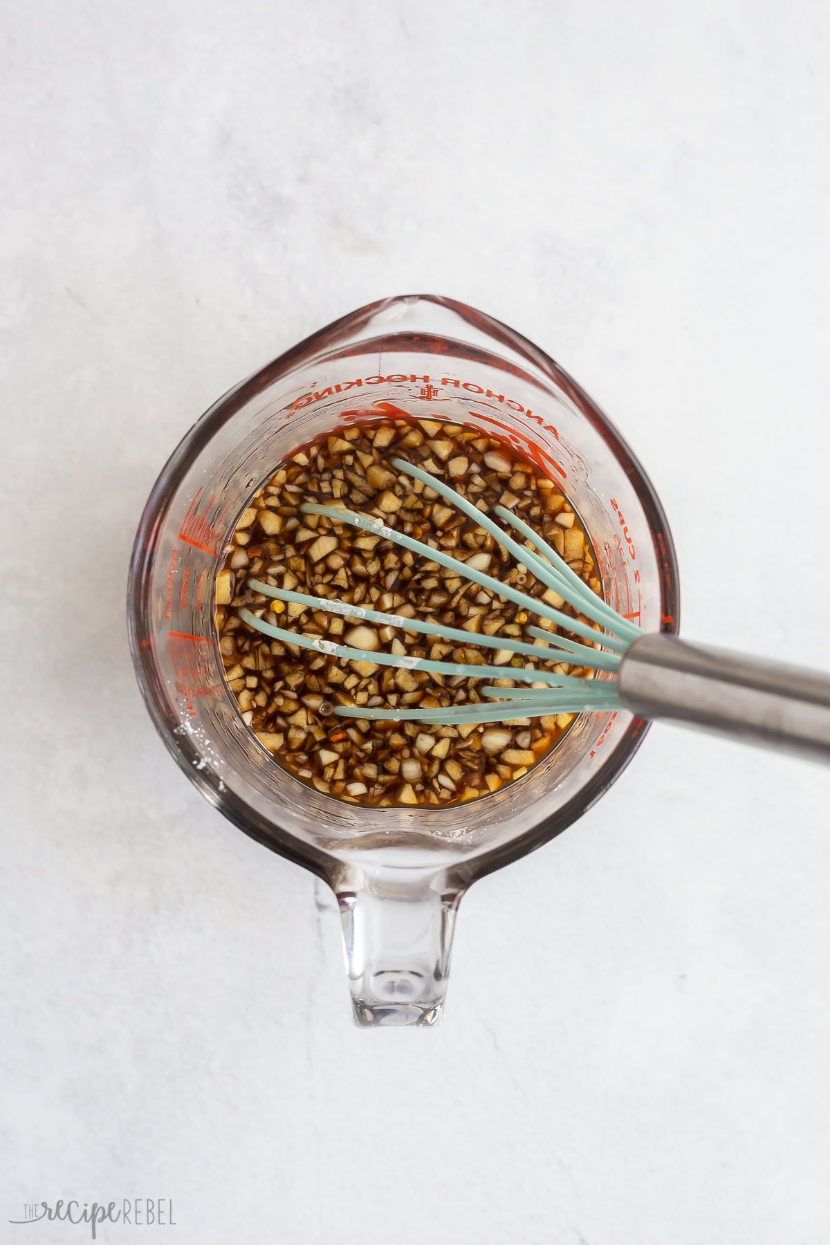 honey garlic sauce stirred together in glass measuring cup