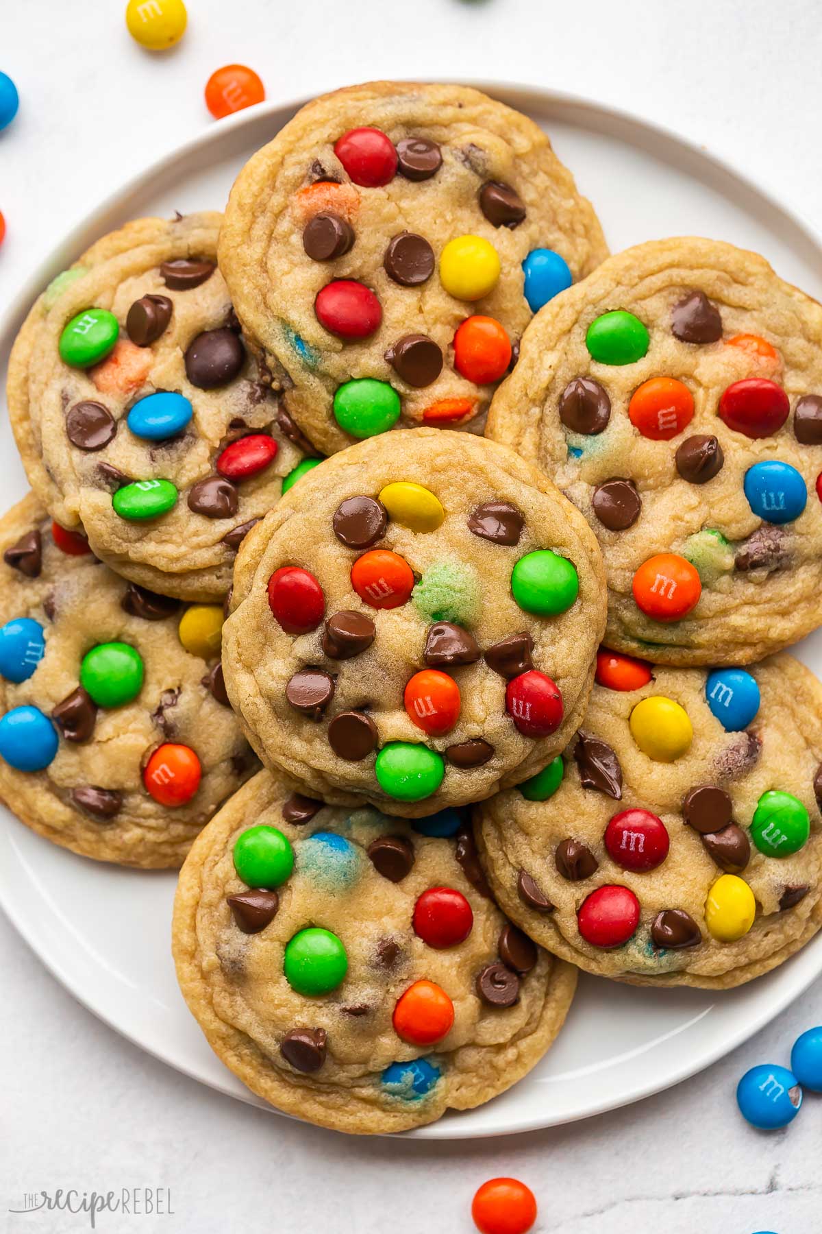 plate of M&M cookies on a white background.