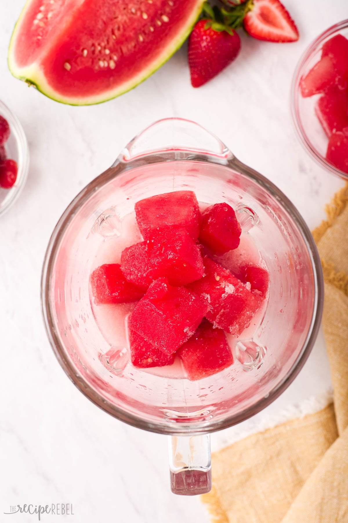 frozen watermelon added to blender to make smoothie.