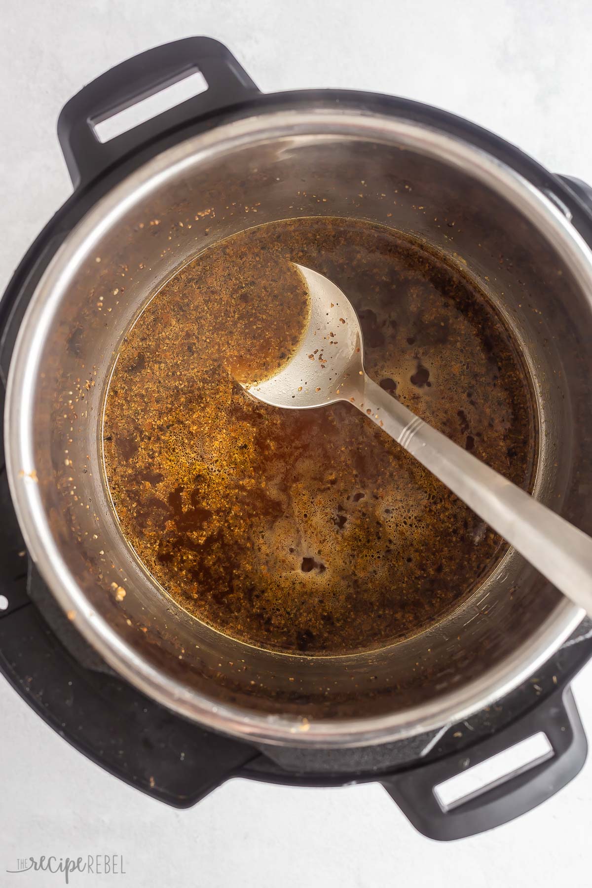 deglazing the instant pot with liquid.