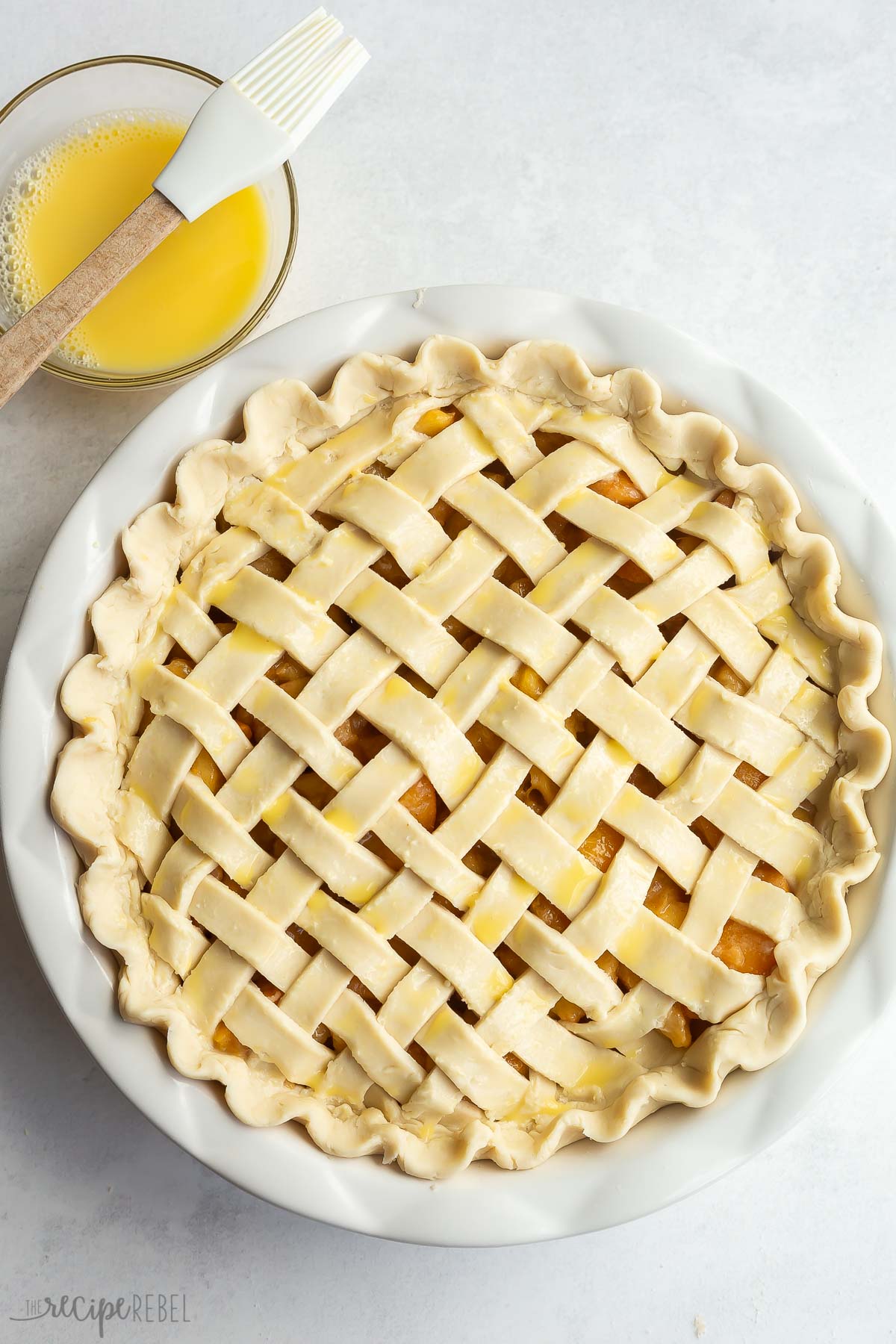 unbaked lattice crust with egg wash over top.
