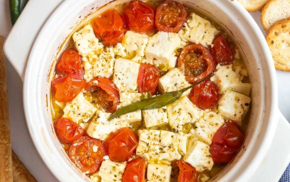 spicy baked feta with cherry tomatoes after baking.