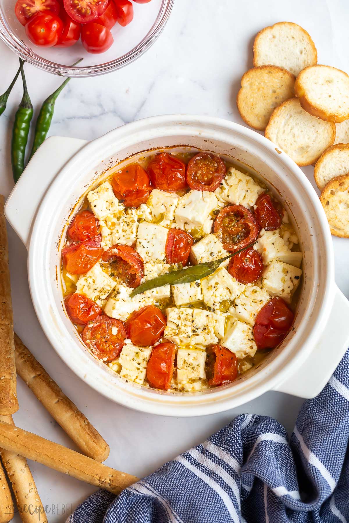 spicy baked feta with cherry tomatoes after baking.