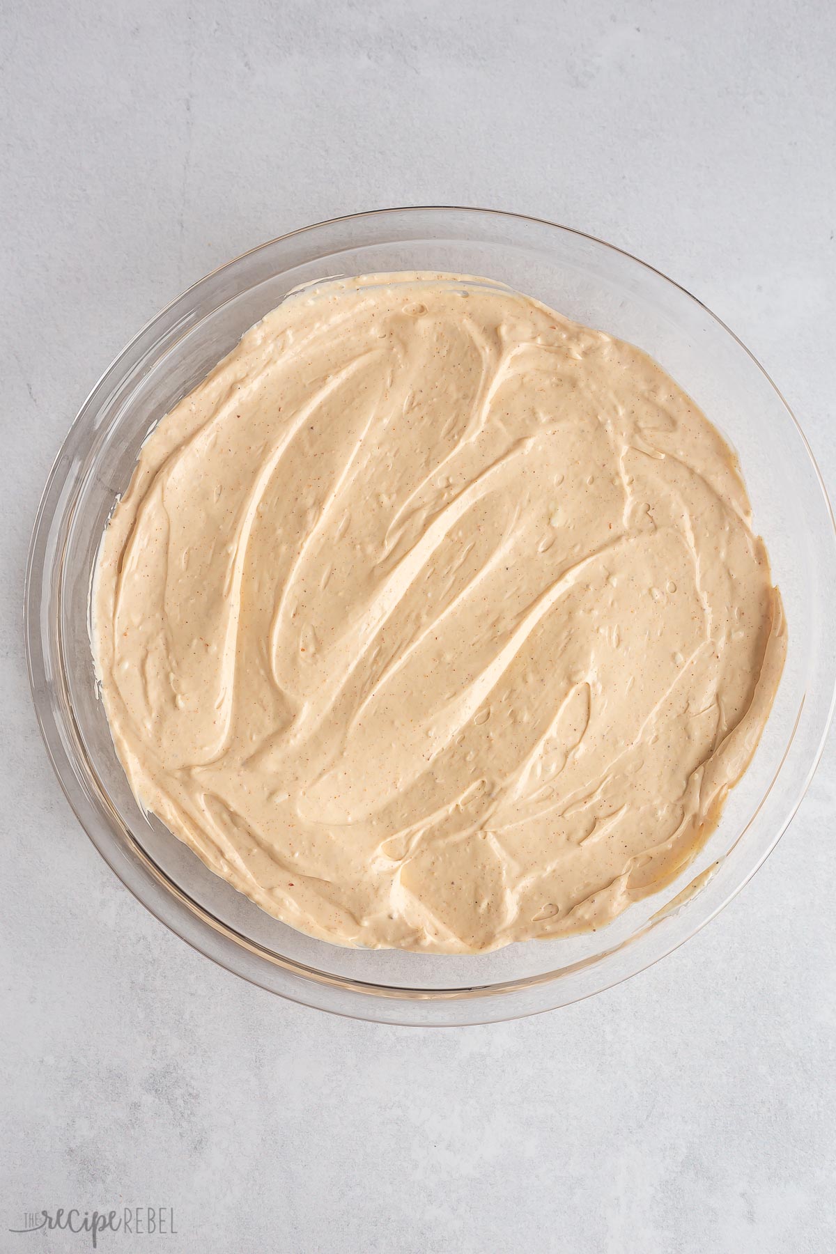 spiced cream cheese mixture spread into glass pie plate.