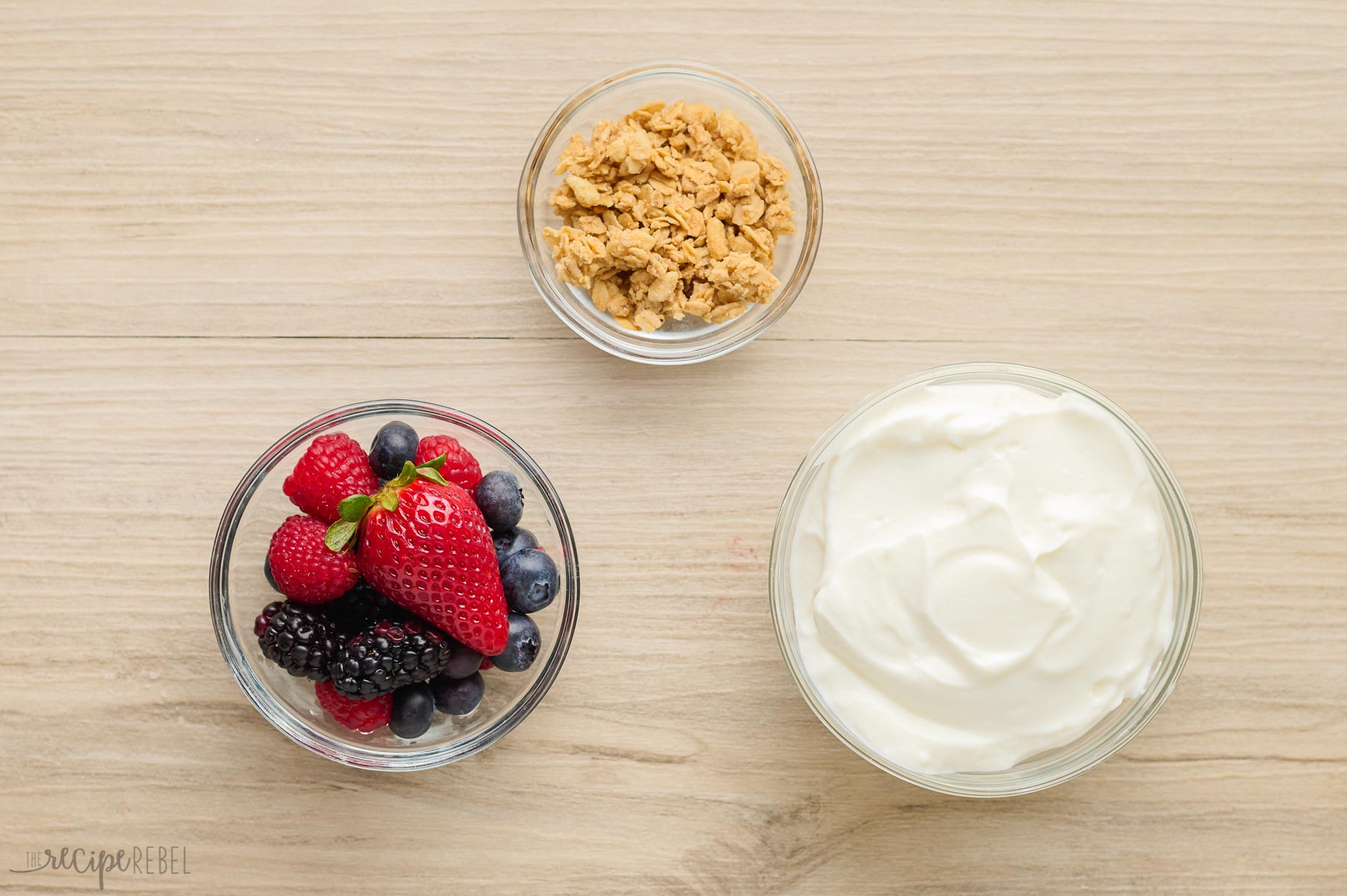 ingredients needed to make a basic yogurt parfait.