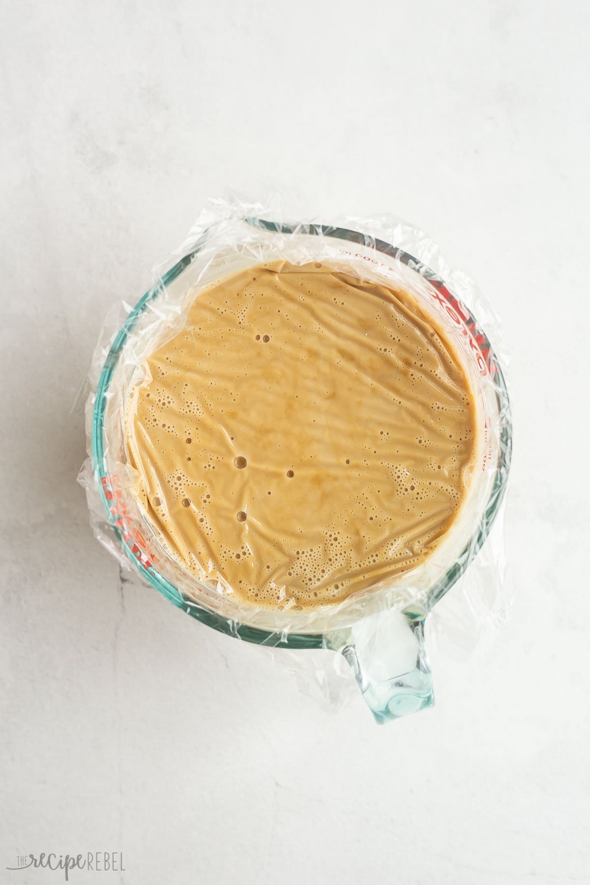 coffee custard ice cream base in glass measuring cup to chill.