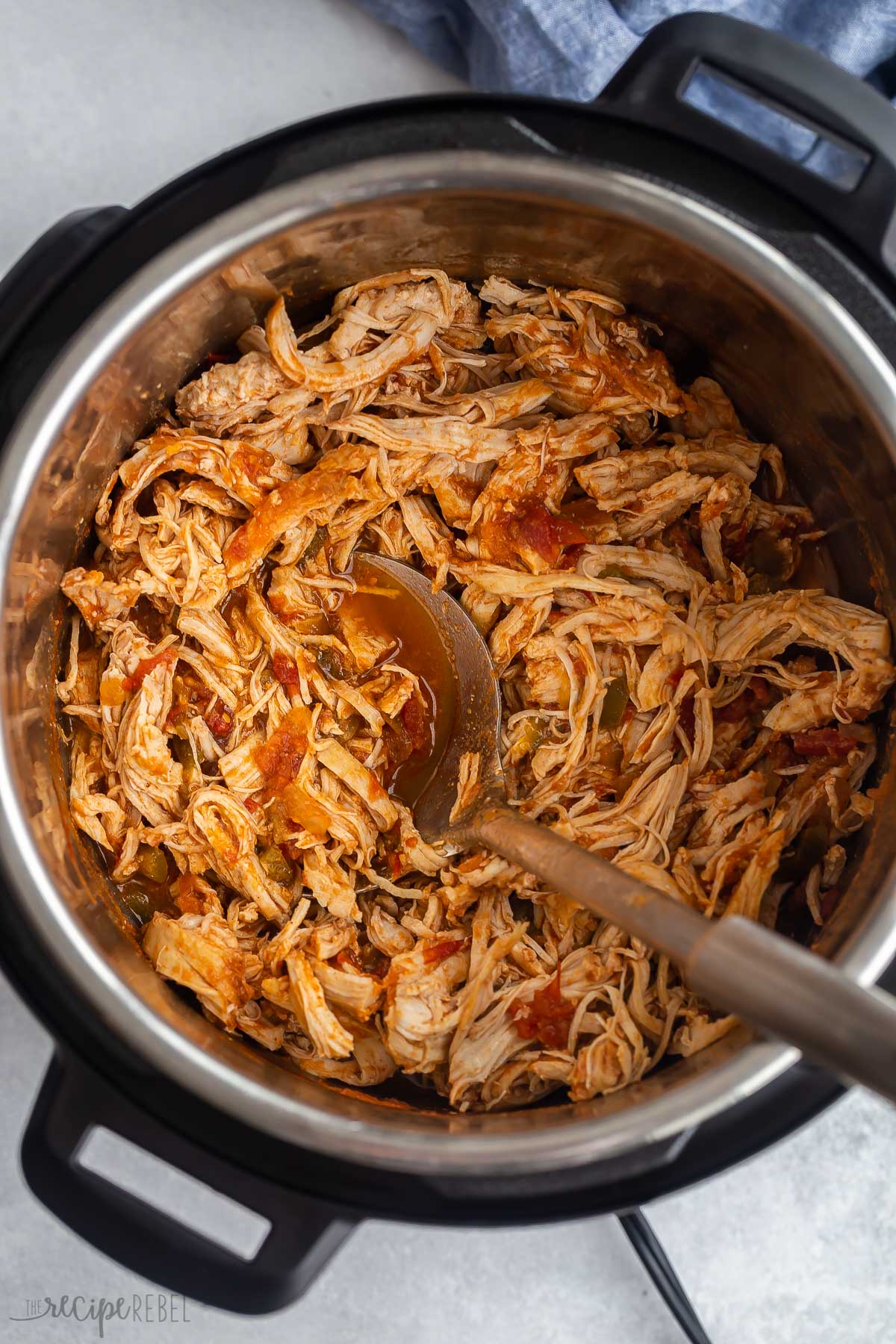 overhead image of instant pot salsa chicken in instant pot liner.