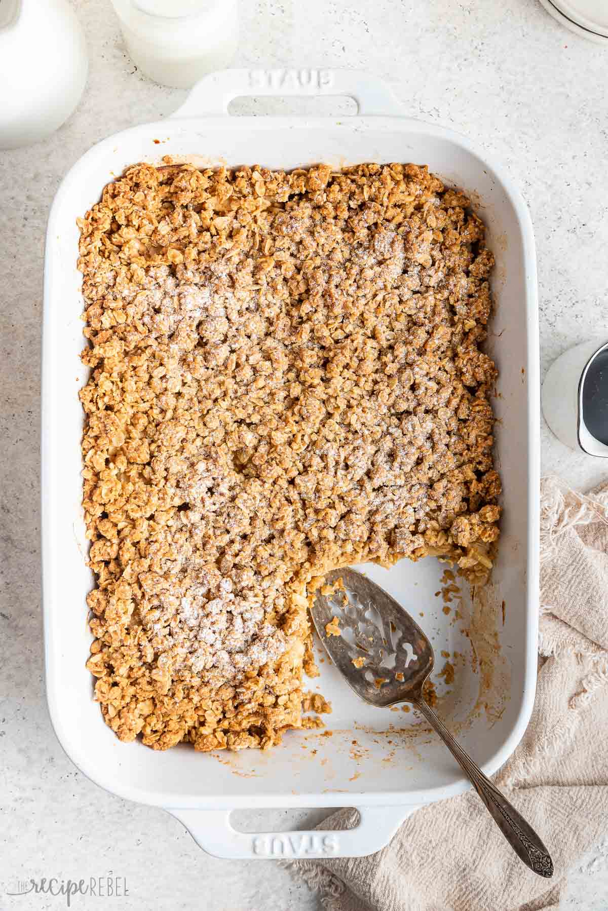 overhead image of apple crisp french toast in white baking dish.